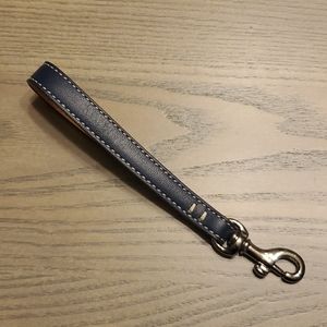 Small Navy Blue Coach Wristlet Strap